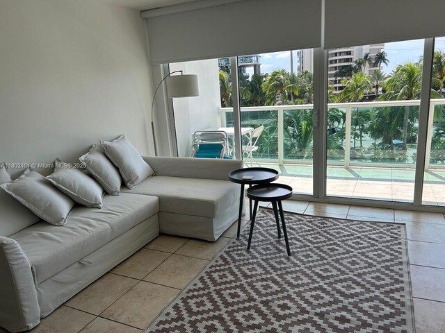 100 Bayview Dr Unit 309, Sunny Isles Beach, FL 33160 - living room with plenty of natural light and light tile patterned floors