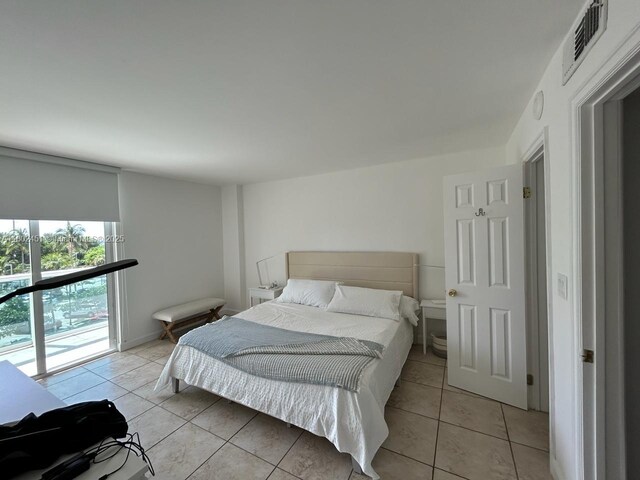 100 Bayview Dr Unit 309, Sunny Isles Beach, FL 33160 - bedroom featuring light tile patterned floors