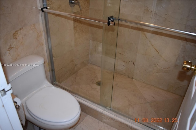 100 Bayview Dr Unit 309, Sunny Isles Beach, FL 33160 - bathroom with toilet and a stall shower
