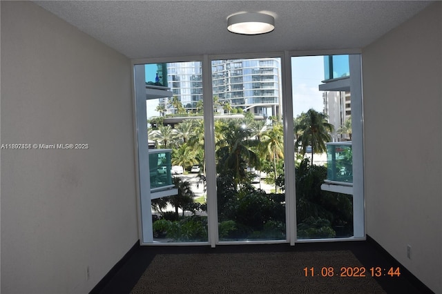 100 Bayview Dr Unit 309, Sunny Isles Beach, FL 33160 - detailed view of a textured ceiling and baseboards