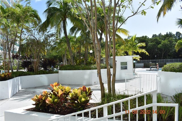 100 Bayview Dr Unit 309, Sunny Isles Beach, FL 33160 - exterior space with a patio area and fence