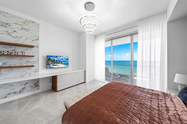 18501 Collins Ave Unit 501, Sunny Isles Beach, FL 33160 - bedroom featuring access to outside, a chandelier, and marble finish flooring