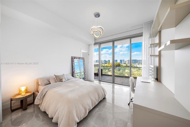18501 Collins Ave Unit 501, Sunny Isles Beach, FL 33160 - bedroom with access to exterior, light marble finish flooring, and a chandelier