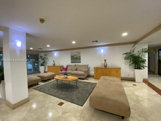 1455 N Treasure Dr Unit 4N, North Bay Village, FL 33141 - living area with recessed lighting, baseboards, and light tile patterned floors
