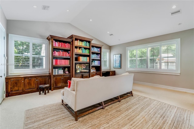 living area with carpet floors, vaulted ceiling, recessed lighting, and baseboards