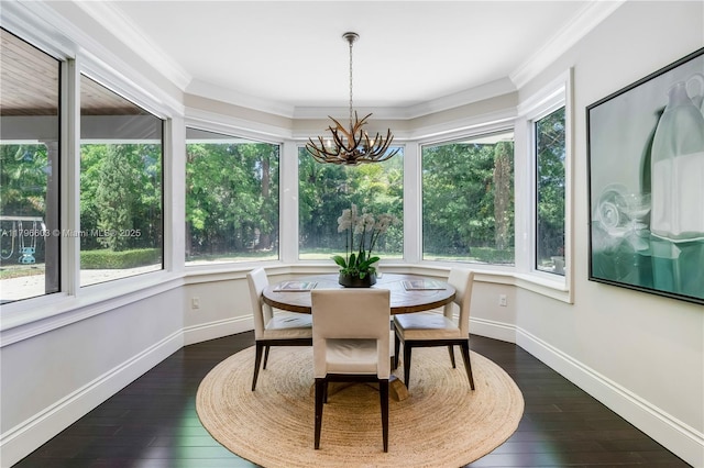 sunroom with a chandelier, healthy amount of natural light, baseboards, hardwood / wood-style flooring, and crown molding