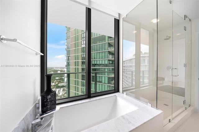 480 NE 31st St Unit 4207, Miami, FL 33137 - bathroom featuring a shower stall and a bath