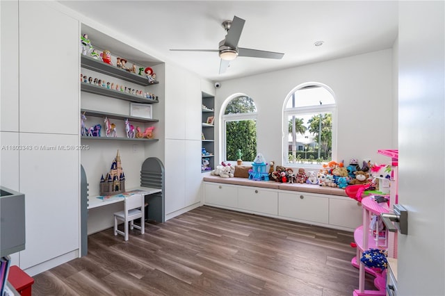5978 Alton Rd, Miami Beach, FL 33140 - playroom featuring dark wood finished floors and a ceiling fan