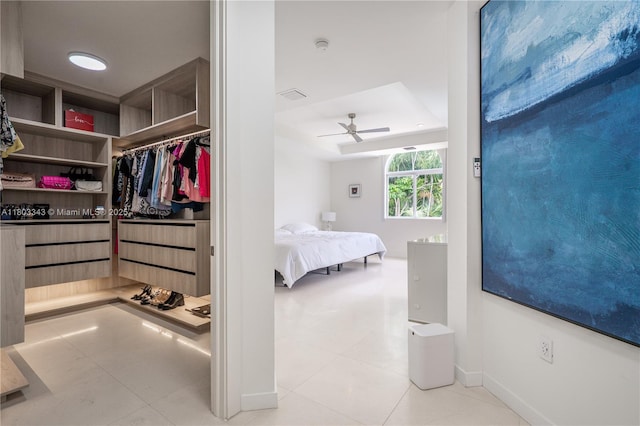 5978 Alton Rd, Miami Beach, FL 33140 - tiled bedroom featuring baseboards