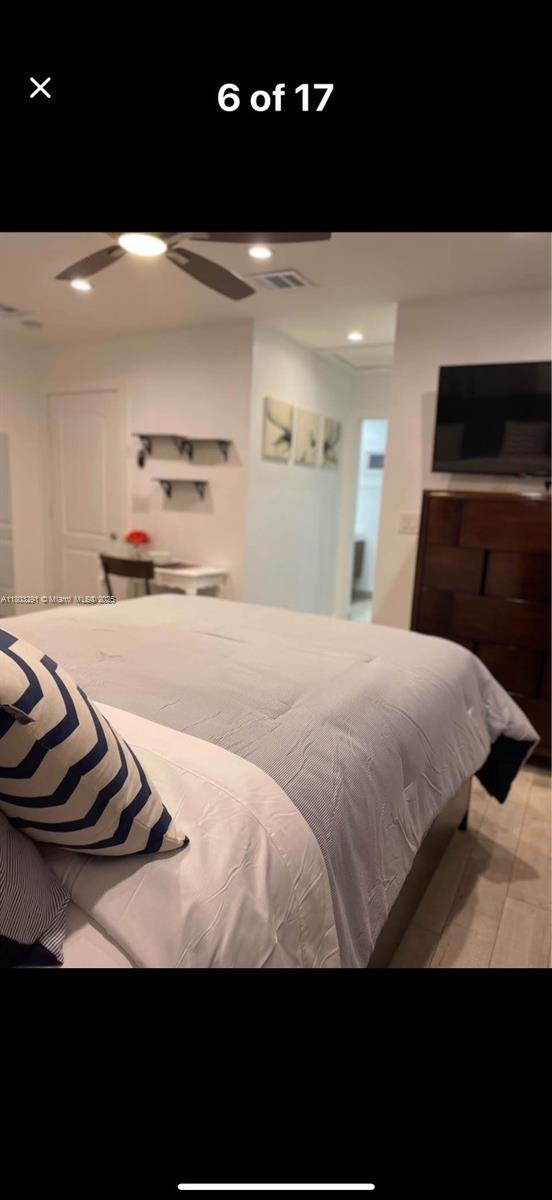bedroom with recessed lighting