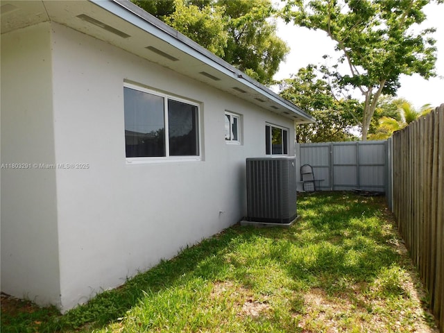 view of yard with central AC