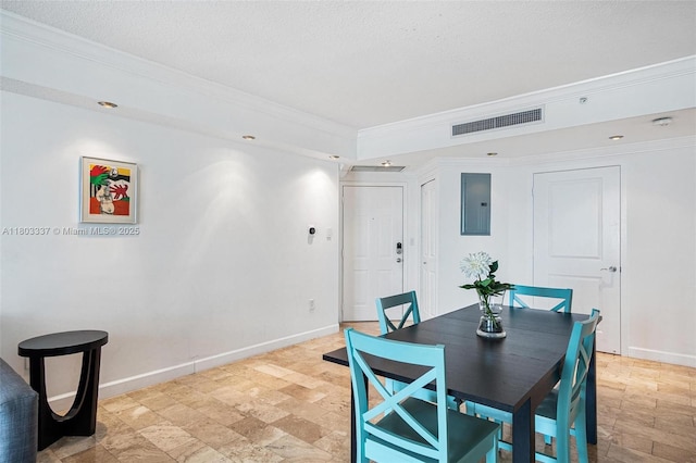 170 SE 14th St Unit 2805, Miami, FL 33131 - dining area with crown molding, light stone finish floors, baseboards, and electric panel