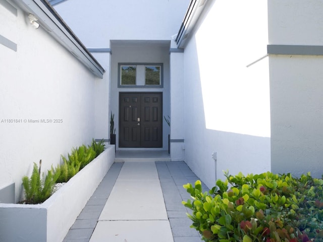 1132 Cedar Falls Dr, Weston, FL 33327 - view of exterior entry featuring stucco siding