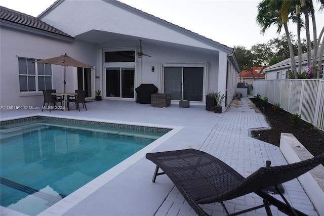 1132 Cedar Falls Dr, Weston, FL 33327 - view of swimming pool with a ceiling fan, a patio area, and a fenced backyard