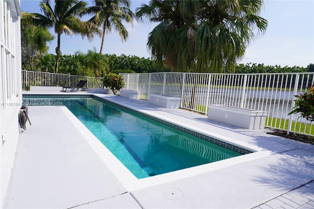 1132 Cedar Falls Dr, Weston, FL 33327 - view of swimming pool with a patio and a water view