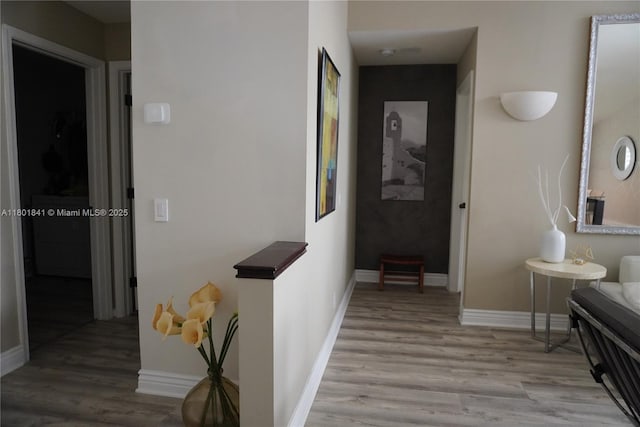 1132 Cedar Falls Dr, Weston, FL 33327 - hallway with light wood finished floors and baseboards