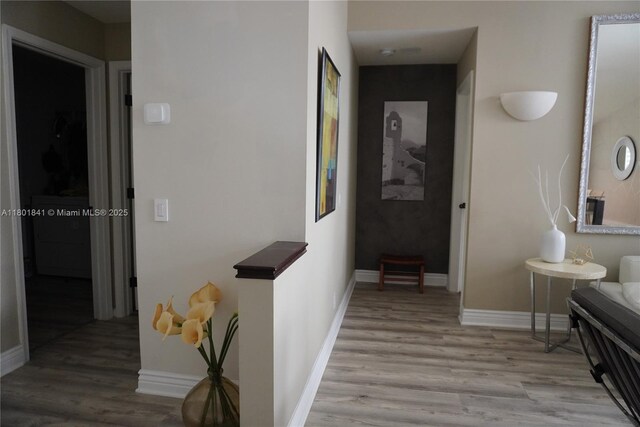 1132 Cedar Falls Dr, Weston, FL 33327 - corridor featuring light wood-type flooring