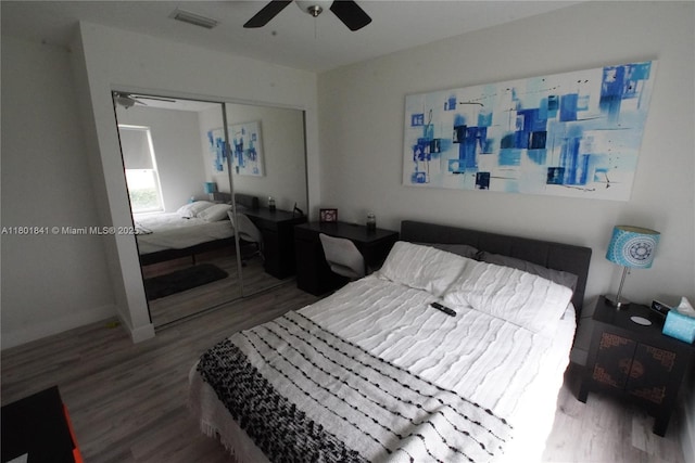 1132 Cedar Falls Dr, Weston, FL 33327 - bedroom with wood finished floors, a closet, a ceiling fan, and baseboards