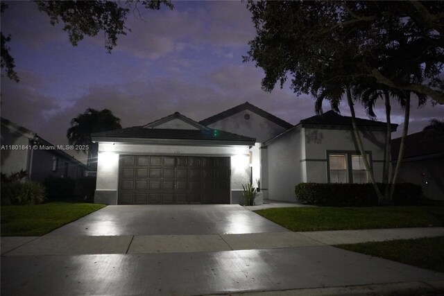 1132 Cedar Falls Dr, Weston, FL 33327 - single story home featuring stucco siding, driveway, a garage, and a front lawn