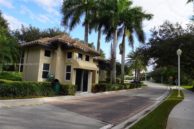 1132 Cedar Falls Dr, Weston, FL 33327 - view of front of home featuring stucco siding and a tiled roof
