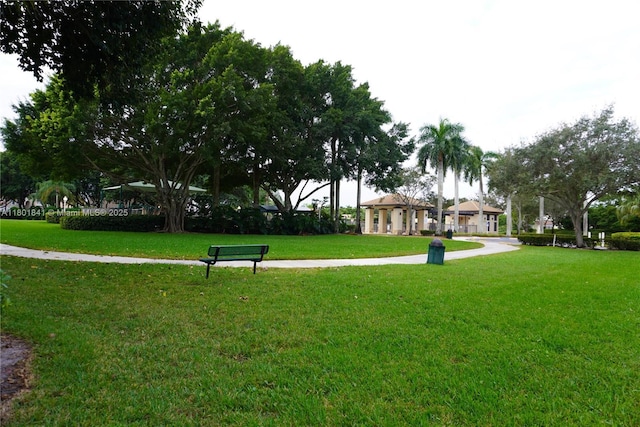 1132 Cedar Falls Dr, Weston, FL 33327 - surrounding community featuring a lawn
