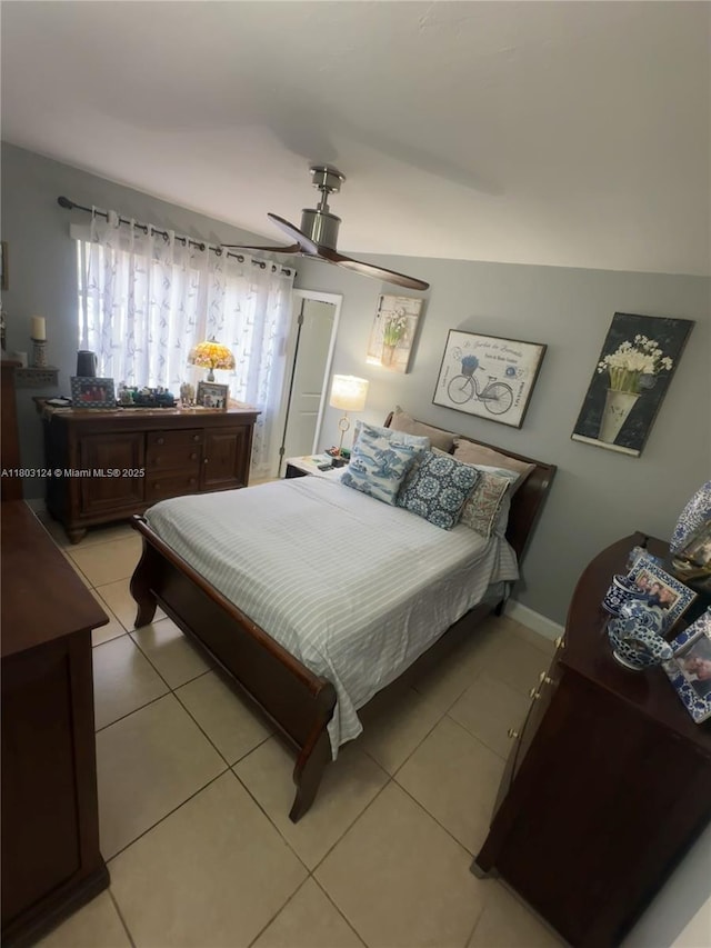 13707 Kendale Lakes Cir Unit 110, Miami, FL 33183 - bedroom featuring light tile patterned flooring and a ceiling fan