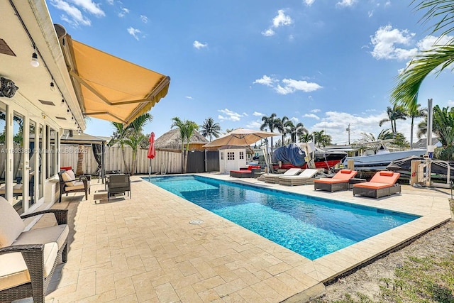 963 Nautilus Isle, Dania Beach, FL 33004 - view of swimming pool featuring a patio area and a fenced backyard