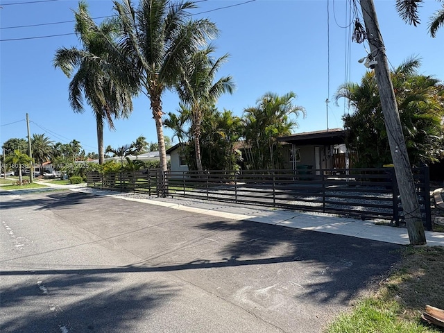 963 Nautilus Isle, Dania Beach, FL 33004 - view of street featuring a gate