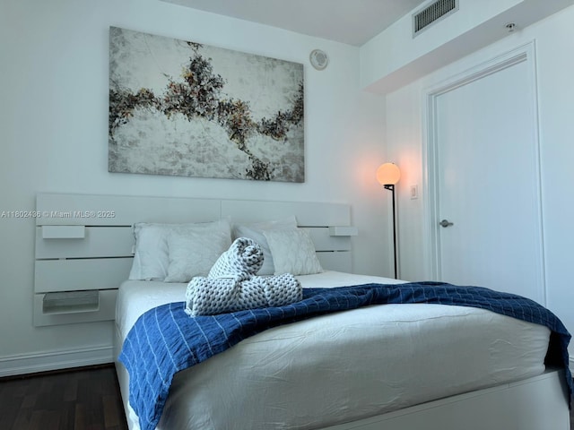 9066 SW 73rd Ct Unit 1703, Miami, FL 33156 - bedroom featuring wood finished floors and baseboards