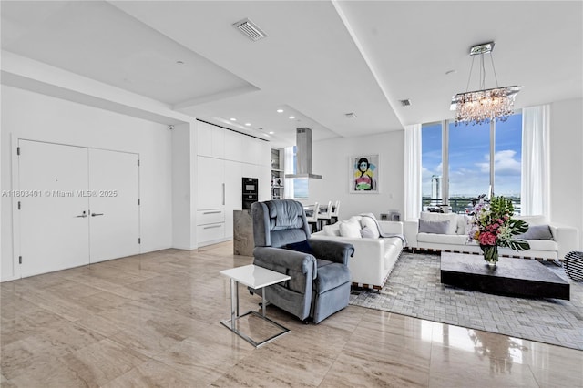 1445 16th St Unit Ph-4, Miami Beach, FL 33139 - living area featuring a chandelier and recessed lighting