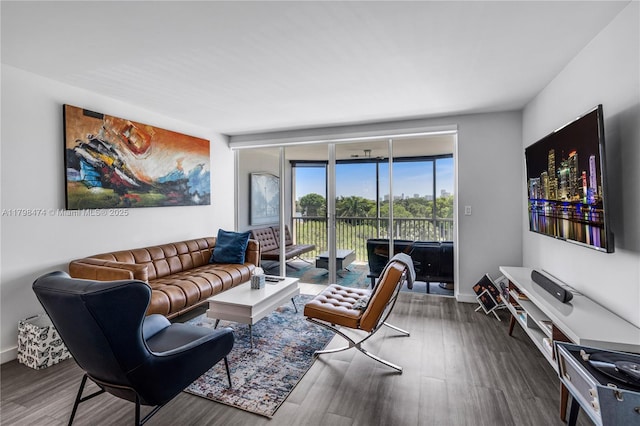 1780 NE 191st St Unit 501-2, Miami, FL 33179 - living room with dark wood-style floors and baseboards