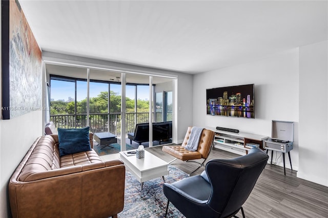 1780 NE 191st St Unit 501-2, Miami, FL 33179 - living area featuring wood finished floors and baseboards