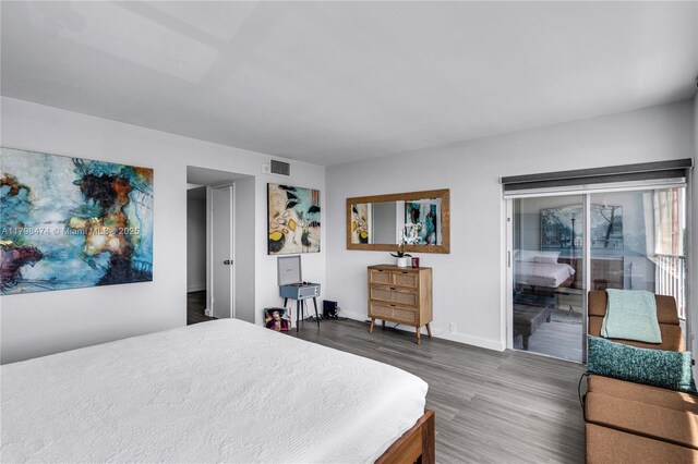 1780 NE 191st St Unit 501-2, Miami, FL 33179 - bedroom featuring wood finished floors and baseboards