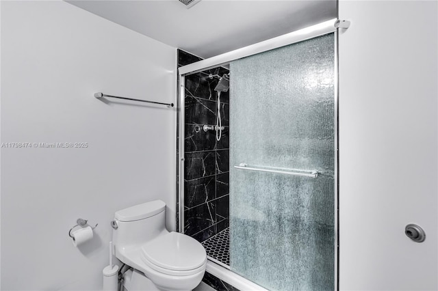 1780 NE 191st St Unit 501-2, Miami, FL 33179 - full bathroom with a shower stall and toilet