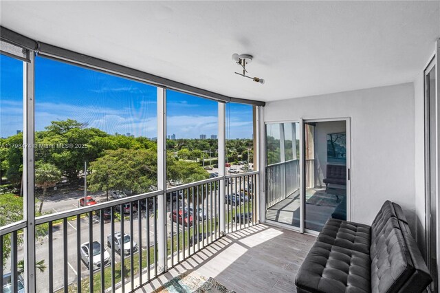 1780 NE 191st St Unit 501-2, Miami, FL 33179 - balcony featuring view of wooded area