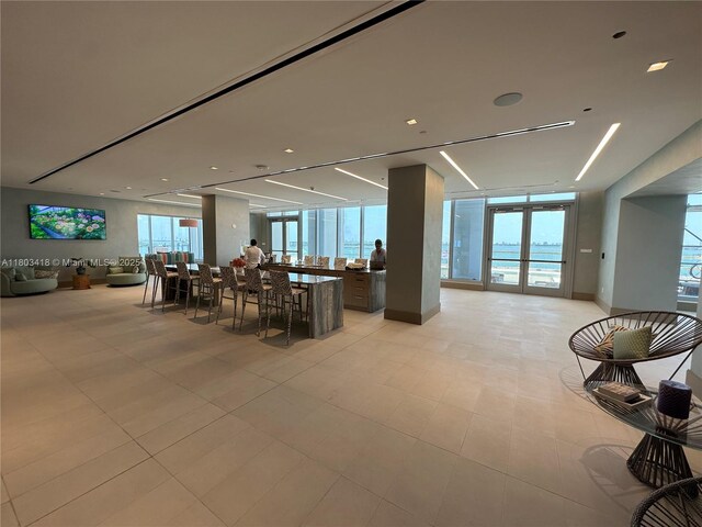 700 NE 26th Ter Unit 903, Miami, FL 33137 - community lobby featuring a wall of windows