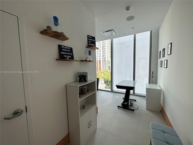 700 NE 26th Ter Unit 903, Miami, FL 33137 - corridor with a wall of windows