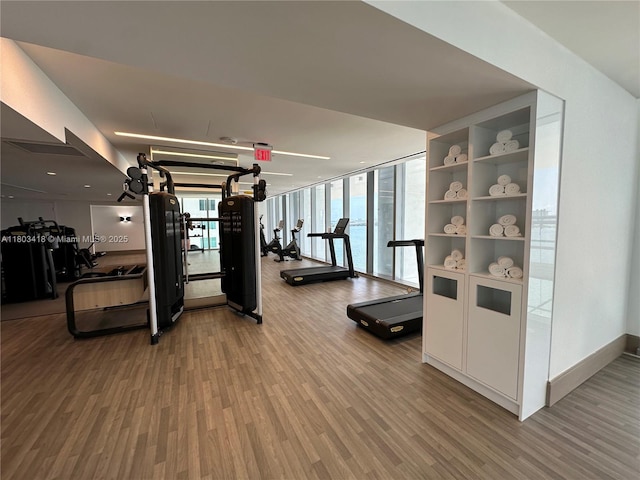 700 NE 26th Ter Unit 903, Miami, FL 33137 - workout area featuring wood finished floors and expansive windows