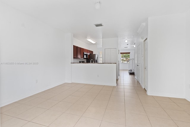 9153 SW 227th St Unit 3, Cutler Bay, FL 33190 - unfurnished living room with light tile patterned flooring