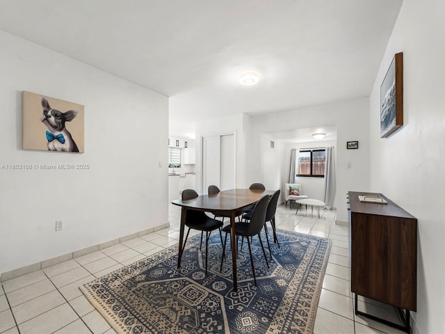 2720 SW 76th Ave, Miami, FL 33155 - dining area featuring light tile patterned flooring and baseboards
