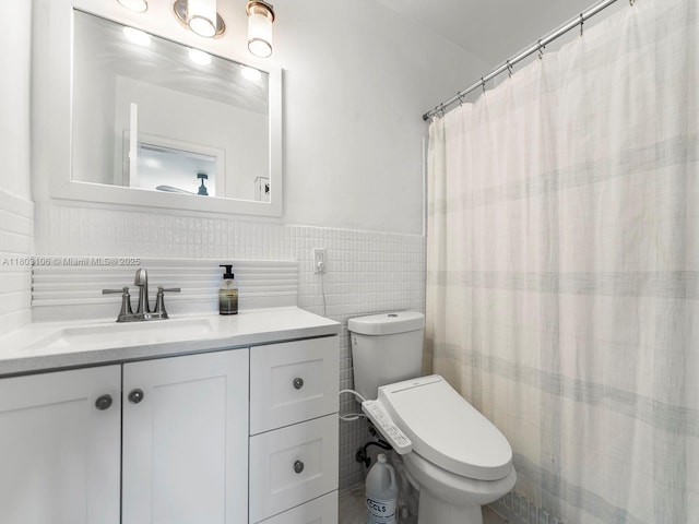 2720 SW 76th Ave, Miami, FL 33155 - full bath featuring vanity, toilet, tile walls, and a wainscoted wall