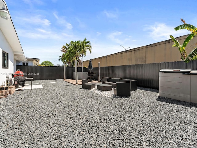 2720 SW 76th Ave, Miami, FL 33155 - fenced backyard with an outdoor hangout area and a patio area