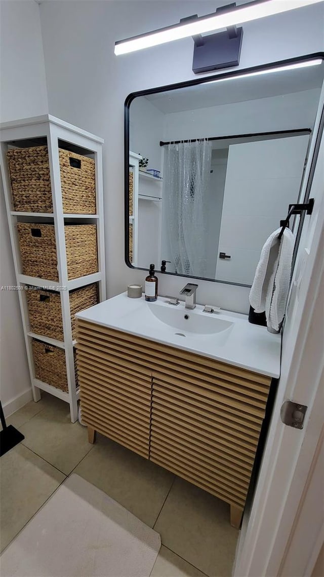 10670 SW 156th Pl Unit 313, Miami, FL 33196 - bathroom with tile patterned flooring, vanity, and curtained shower