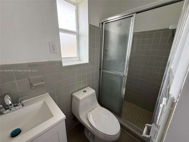 1345 NE 199th St, Miami, FL 33179 - full bath with tile walls, a shower stall, toilet, and vanity