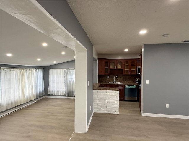 1345 NE 199th St, Miami, FL 33179 - kitchen featuring stainless steel appliances, a sink, baseboards, light wood finished floors, and recessed lighting