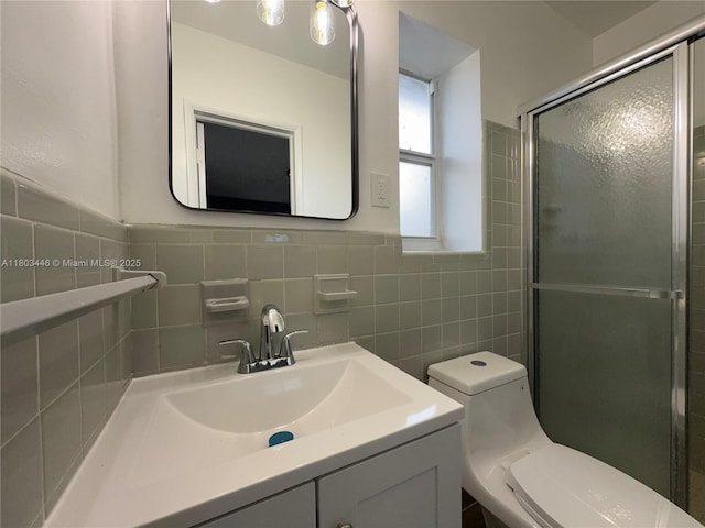 1345 NE 199th St, Miami, FL 33179 - full bath featuring toilet, an enclosed shower, vanity, and tile walls