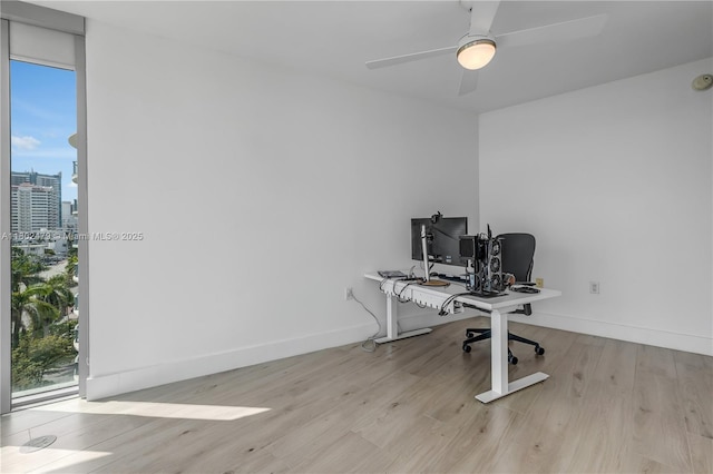 6620 Indian Creek Dr Unit 619, Miami Beach, FL 33141 - office space featuring plenty of natural light, wood finished floors, ceiling fan, and baseboards