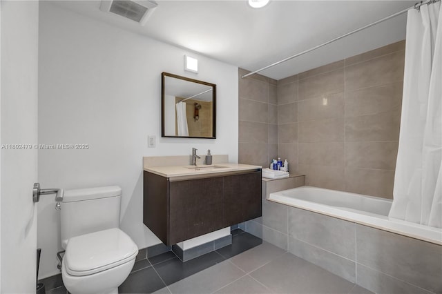 6620 Indian Creek Dr Unit 619, Miami Beach, FL 33141 - full bath with tile patterned floors, toilet, vanity, and tiled shower / bath combo