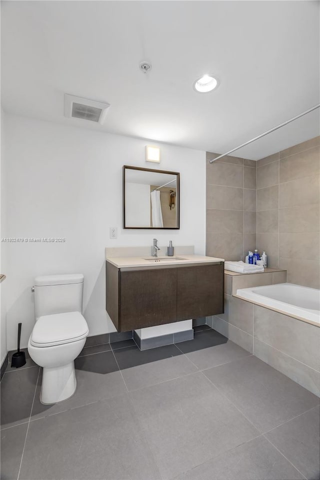6620 Indian Creek Dr Unit 619, Miami Beach, FL 33141 - bathroom with tile patterned floors, toilet, and vanity