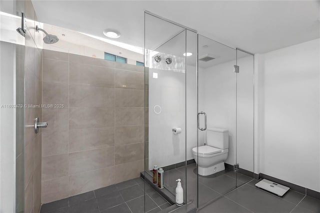6620 Indian Creek Dr Unit 619, Miami Beach, FL 33141 - full bath with a shower stall, toilet, and tile patterned flooring